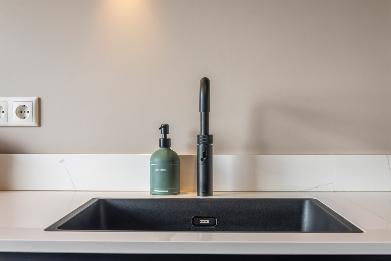 Familie Henriquez - van Asseldonk kraan en spoelbak